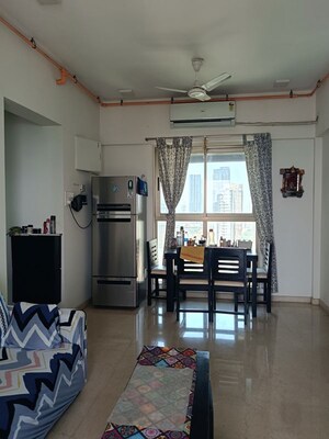Living Room in 2 BHK Apartment at Chandak Cornerstone, Worli – for Rent