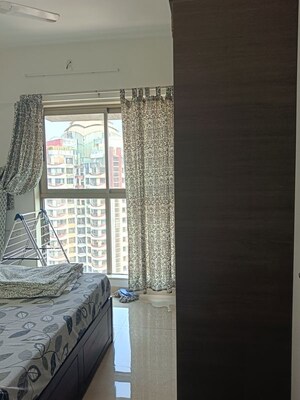 Bedroom in 2 BHK Apartment at Chandak Cornerstone, Worli – for Rent