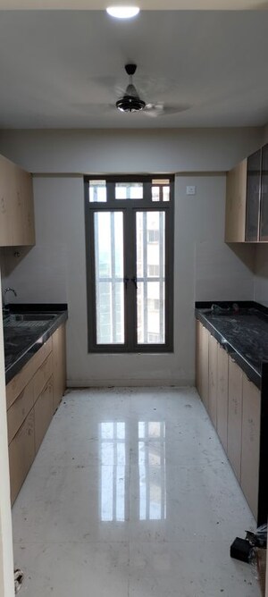 Kitchen in 2 BHK Apartment at Ruparel Sky Green, Kandivali West – for Rent