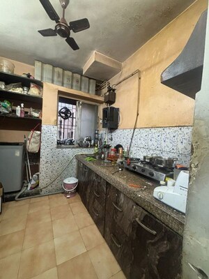 Kitchen in 1 BHK Apartment at Raj Ratna Park CHS, Brahmand – for Rent