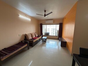 Living Room in 2 BHK Apartment at Kanakia Spaces Niharika, Manpada – for Rent