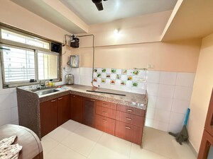 Kitchen in 2 BHK Apartment at Kanakia Spaces Niharika, Manpada – for Rent