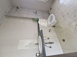 Bathroom in 2 BHK Apartment at Mahagun Mirabella, Sector 79 – for Rent