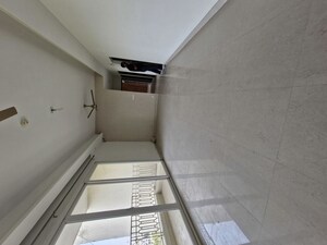 Living Room in 2 BHK Apartment at Mahagun Mirabella, Sector 79 – for Rent