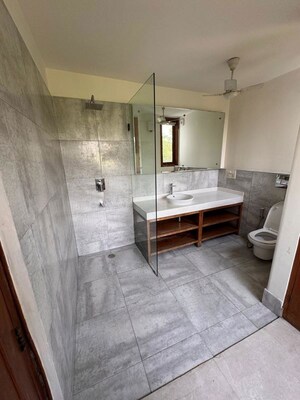 Bathroom in 3 BHK Builder Floor at Defence Colony – for Rent