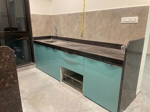 Kitchen in 2 BHK Apartment at Laxmi Heights Malad, Malad West – for Rent