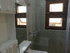 Bathroom in 4 BHK Builder Floor at Kailash Colony – for Rent
