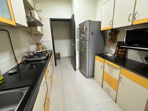 Kitchen in 2.5 BHK Apartment at Oberoi Realty Woods, Goregaon East – for Rent