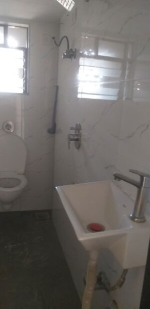 Bathroom in 1 BHK Apartment at Tembhi Naka – for Rent