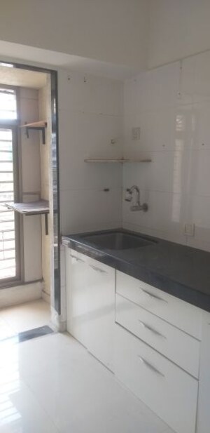 Kitchen in 1 BHK Apartment at Tembhi Naka – for Rent