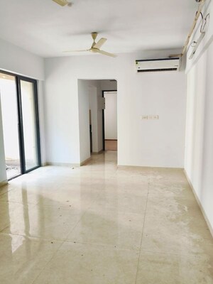 Living Room in 1 BHK Apartment at Lodha Palava City Lakeshore Greens, Dombivli East – for Sale