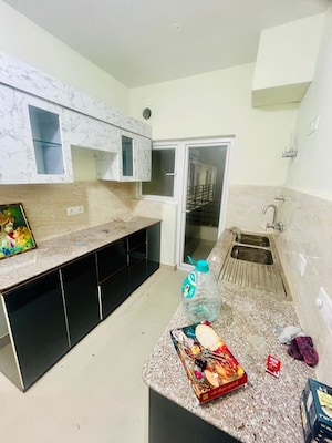 Kitchen in 3 BHK Apartment at Pardos Okas Residency, Sushant Golf City – for Rent