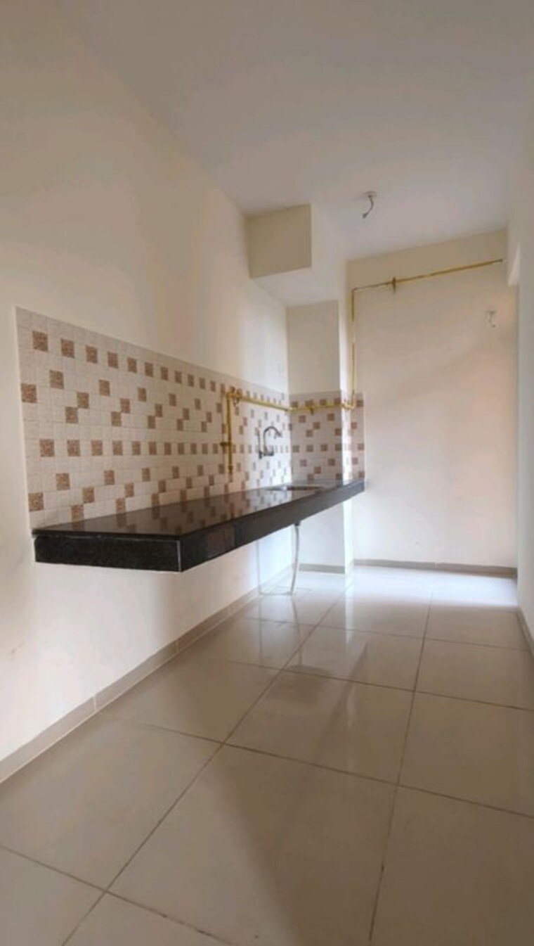 Kitchen, wave-dream-homes 2 Bedroom 840 Sq.Ft. Apartment In Wave City Ghaziabad 10194553