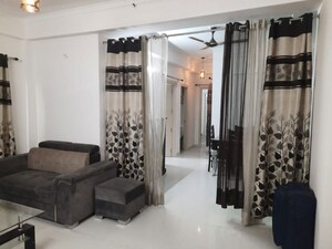 Living Room in 2 BHK Apartment at Galaxy North Avenue ll, Gaur City 2 – for Sale