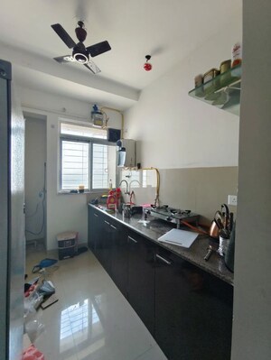 Kitchen in 1 BHK Apartment at Puraniks City Reserva, Ghodbunder Road – for Rent