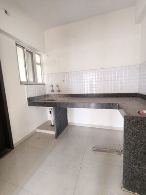 Kitchen in 1 BHK Apartment at Nyati Defence Enclave, Undri – for Rent