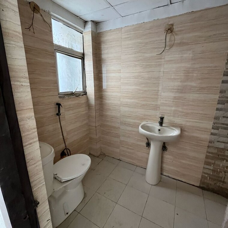 Bathroom, amrapali-zodiac 2 Bedroom 950 Sq.Ft. Apartment In Sector 120 Noida 10195056