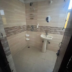 Bathroom in 3 BHK Apartment at Amrapali Zodiac, Sector 120 – for Rent