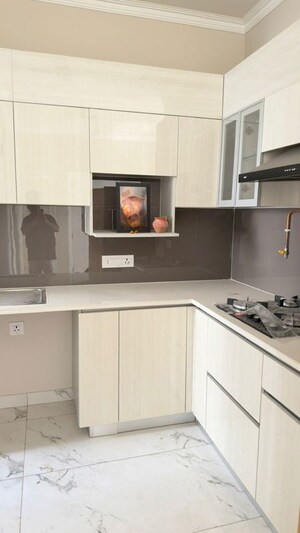 Kitchen in 2.5 BHK Builder Floor at Central Park Cerise Suites, Sohna Sector 33 – for Rent