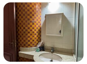Bathroom in 3 BHK Apartment at Greater Kailash – for Rent