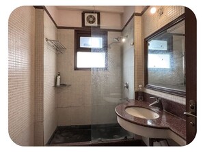 Bathroom in 3 BHK Apartment at Greater Kailash – for Rent