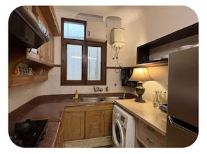 Kitchen in 3 BHK Apartment at Greater Kailash – for Rent