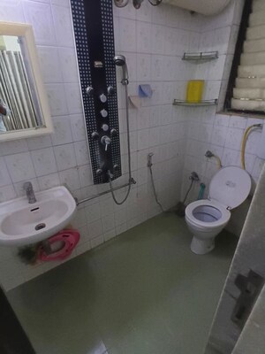 Bathroom in 3 BHK Apartment at Lokhandwala Whispering Palms, Kandivali East – for Rent