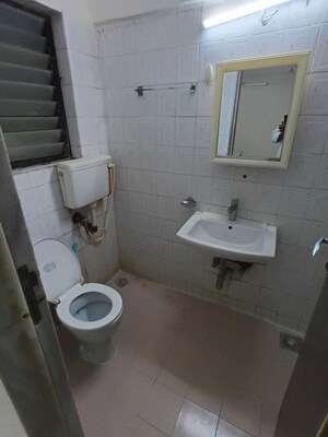 Bathroom in 3 BHK Apartment at Lokhandwala Whispering Palms, Kandivali East – for Rent