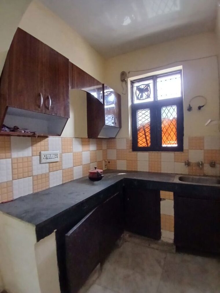 Kitchen, spring-field 2.5 Bedroom 125 Sq.Ft. Builder Floor In Sector 31 Faridabad 10195322