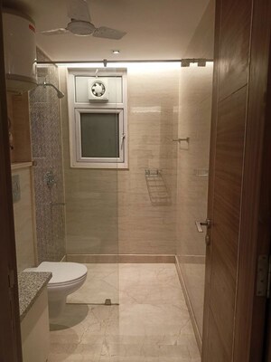 Bathroom in 3 BHK Apartment at Chittaranjan Park – for Rent