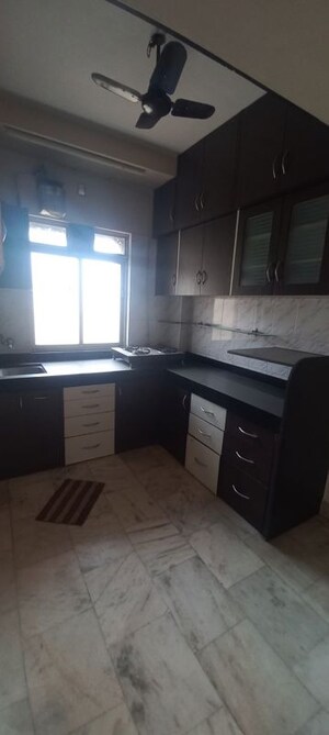 Kitchen in 1 BHK Apartment at Riddhi Garden, Malad East – for Rent