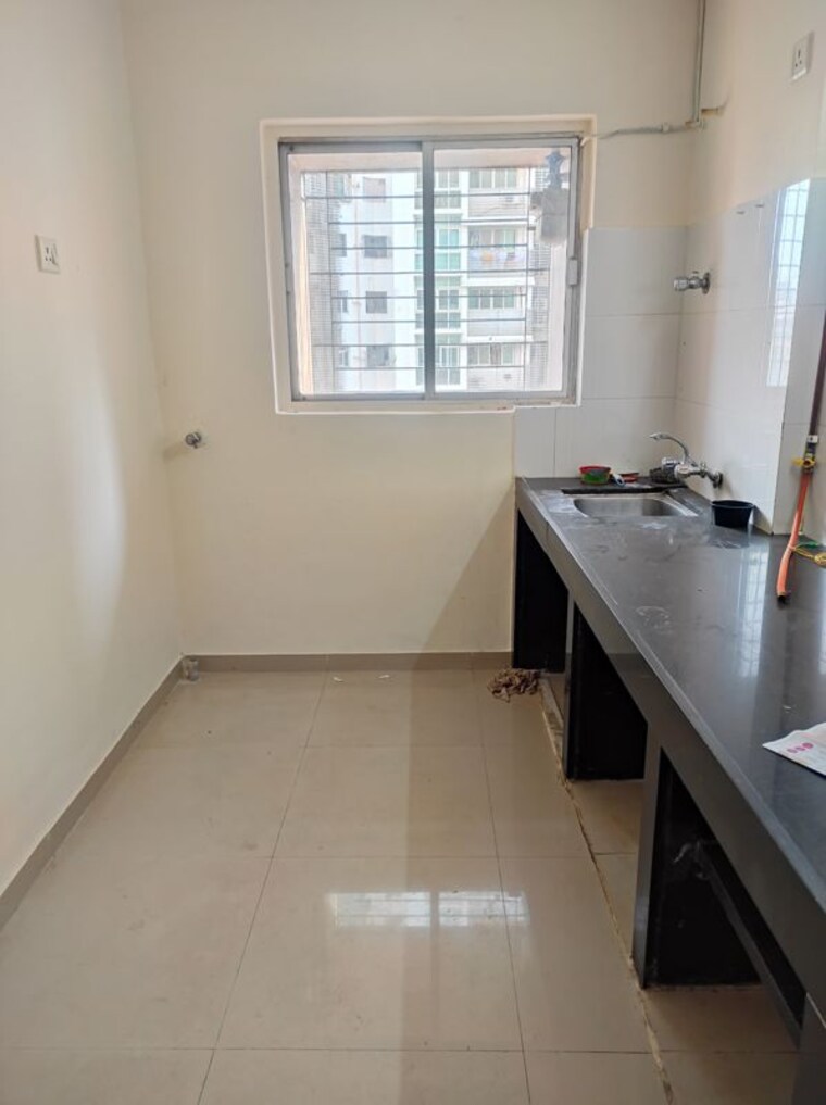 Kitchen, lokhandwala-whispering-palms 1 Bedroom 450 Sq.Ft. Apartment In Kandivali East Mumbai 10195343