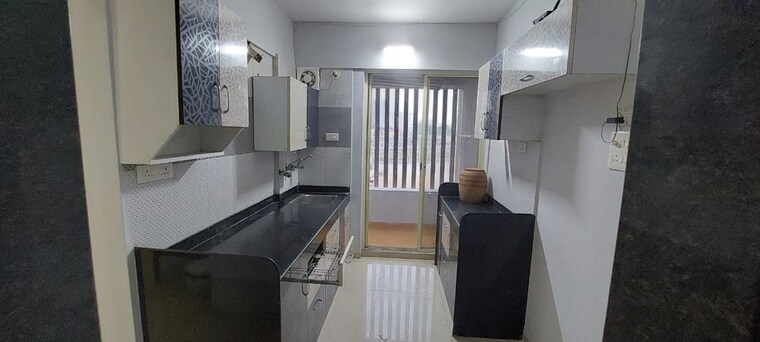 Kitchen, imperal-alassio-residency 2 Bedroom 680 Sq.Ft. Apartment In Ravet Pune 10195354
