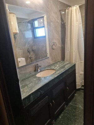 Attached Bathroom in 3.5 BHK Apartment at Ambience Island Lagoon, Sector 24 – for Rent