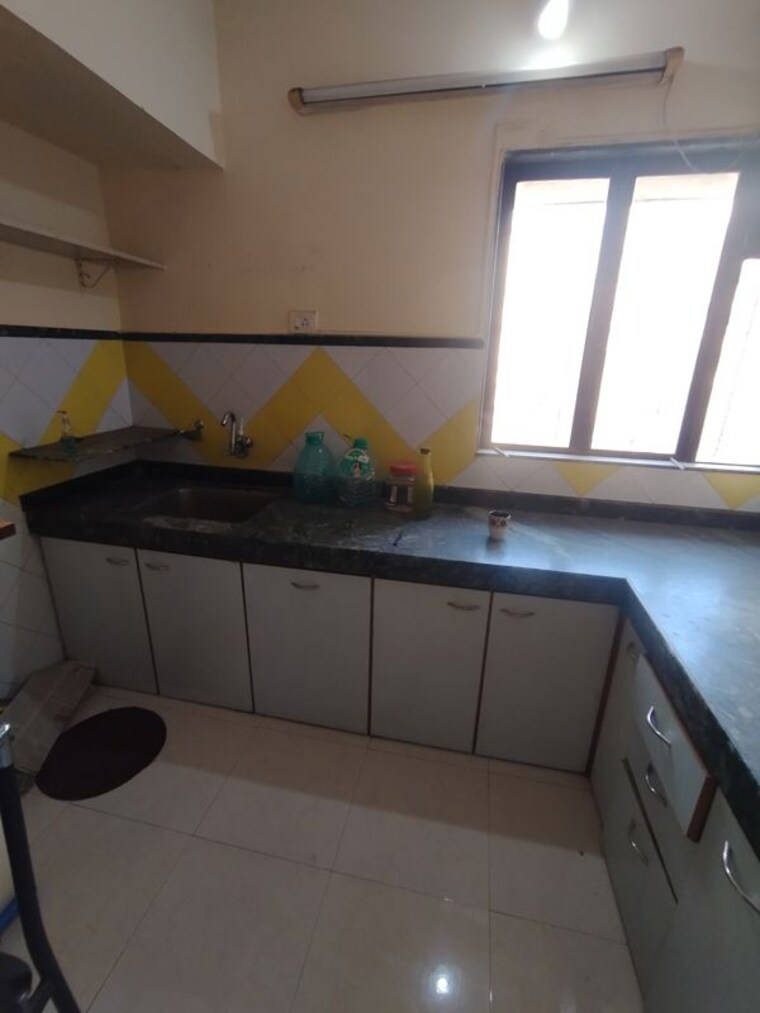 Kitchen, garden-court 1 Bedroom 450 Sq.Ft. Apartment In Waghbil Thane 10195427