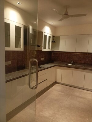 Kitchen in 4 BHK Apartment at Kailash Colony – for Sale
