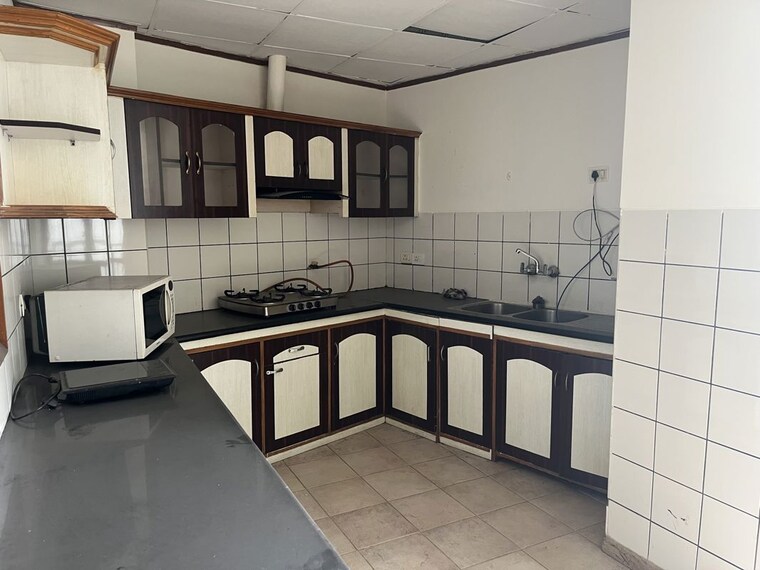 Kitchen, unitech-uniworld-gardens 3 Bedroom 2086 Sq.Ft. Apartment In Sector 47 Gurgaon 10195424