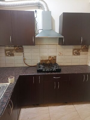 Kitchen in 2 BHK Apartment at Gaur 14th Avenue High Street, Sector 16c Greater Noida – for Rent