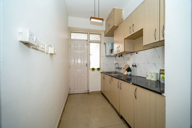 Kitchen, supertech-cape-town 2.5 Bedroom 1150 Sq.Ft. Apartment In Sector 74 Noida 10195516