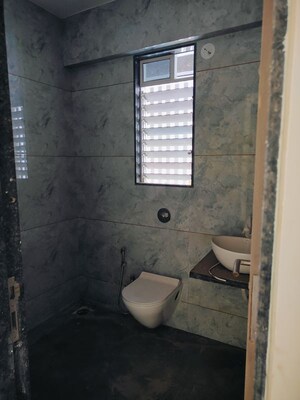 Bathroom in 1 BHK Apartment at Krishna Disha Darshan, Malad West – for Sale