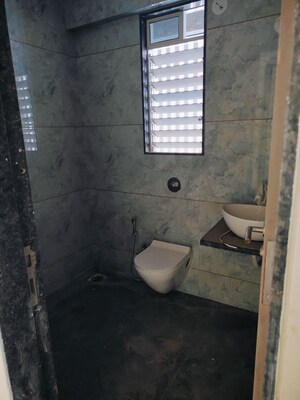 Bathroom in 1 BHK Apartment at Krishna Disha Darshan, Malad West – for Sale