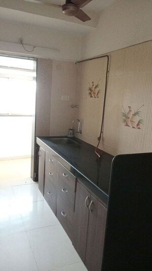Kitchen in 2 BHK Apartment at Sufalam Apartment Chembur, Chembur – for Rent