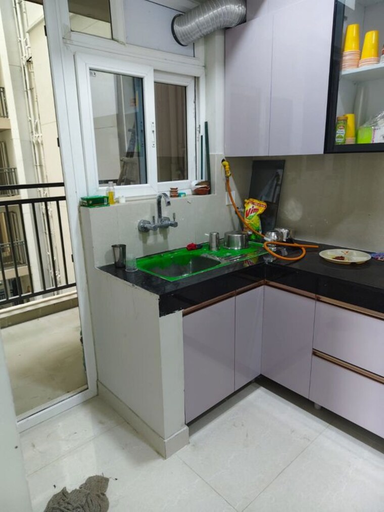 Kitchen, eldeco-live-by-the-greens 3 Bedroom 1404 Sq.Ft. Apartment In Sector 150 Noida 10196010