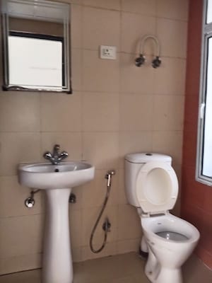 Bathroom in 3 BHK Apartment at Mahagun Mywoods II, Sector 16c Greater Noida – for Rent