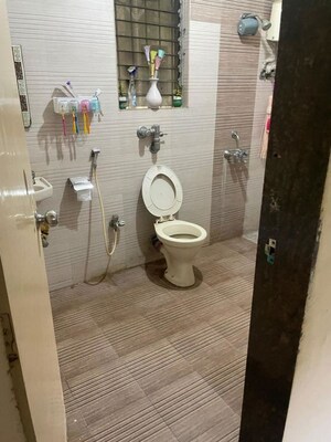 Bathroom in 2 BHK Apartment at Atul Trans Residency, Andheri East – for Rent