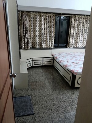 Bedroom in 2 BHK Apartment at Takshila CHS, Andheri East – for Rent