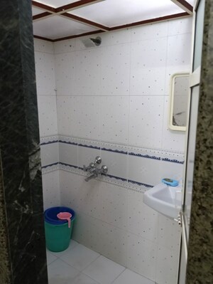 Bathroom in 2 BHK Apartment at Takshila CHS, Andheri East – for Rent