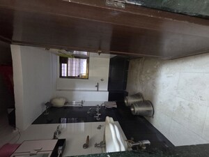 Kitchen in 2 BHK Apartment at New Yashwant CHS, Charai – for Rent