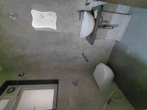 Bathroom in 3 BHK Apartment at Karwa Emticibom Employees CHSL, Malad West – for Rent