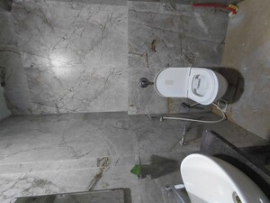 Bathroom in 3 BHK Apartment at Karwa Emticibom Employees CHSL, Malad West – for Rent